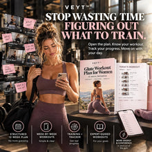 Woman in the gym checking today's glute workout from the 12-week workout plan